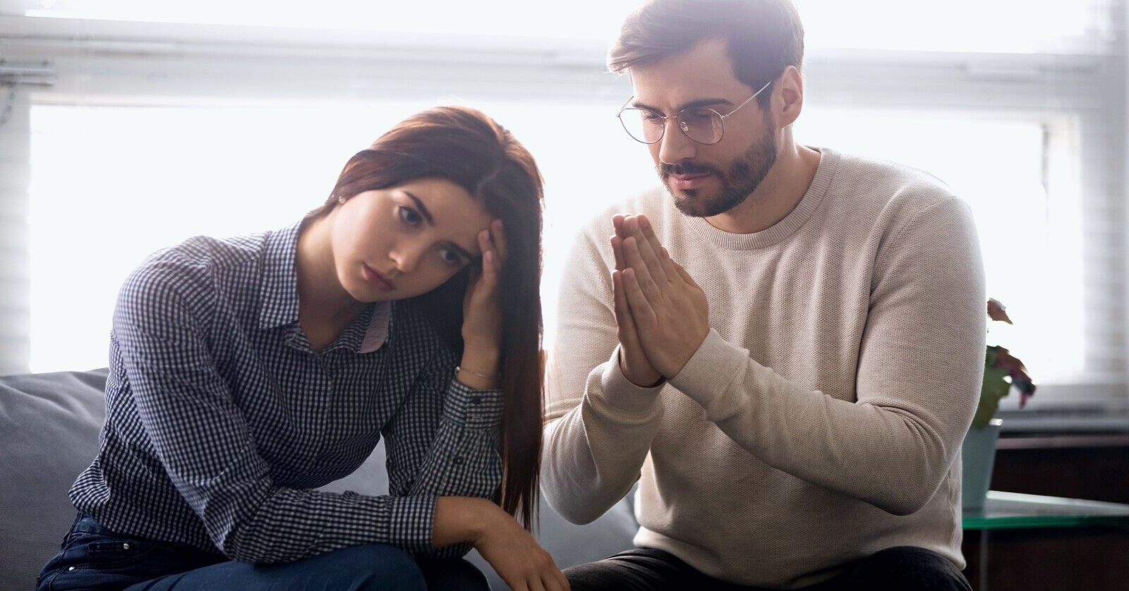 man showing signs he regrets cheating on you by begging for forgiveness