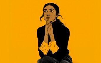 A thoughtful young woman with dark hair sits against a bright yellow background, hands pressed together near her face, gazing upward. She wears a black top with yellow cuffs and appears to be deep in contemplation.
